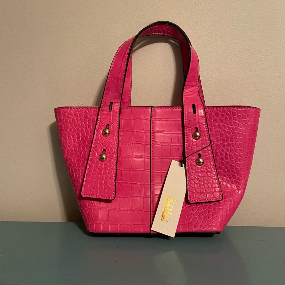 NWT Kate Landry Fuchsia crocodile patterned tabs satchel with shoulder strap.